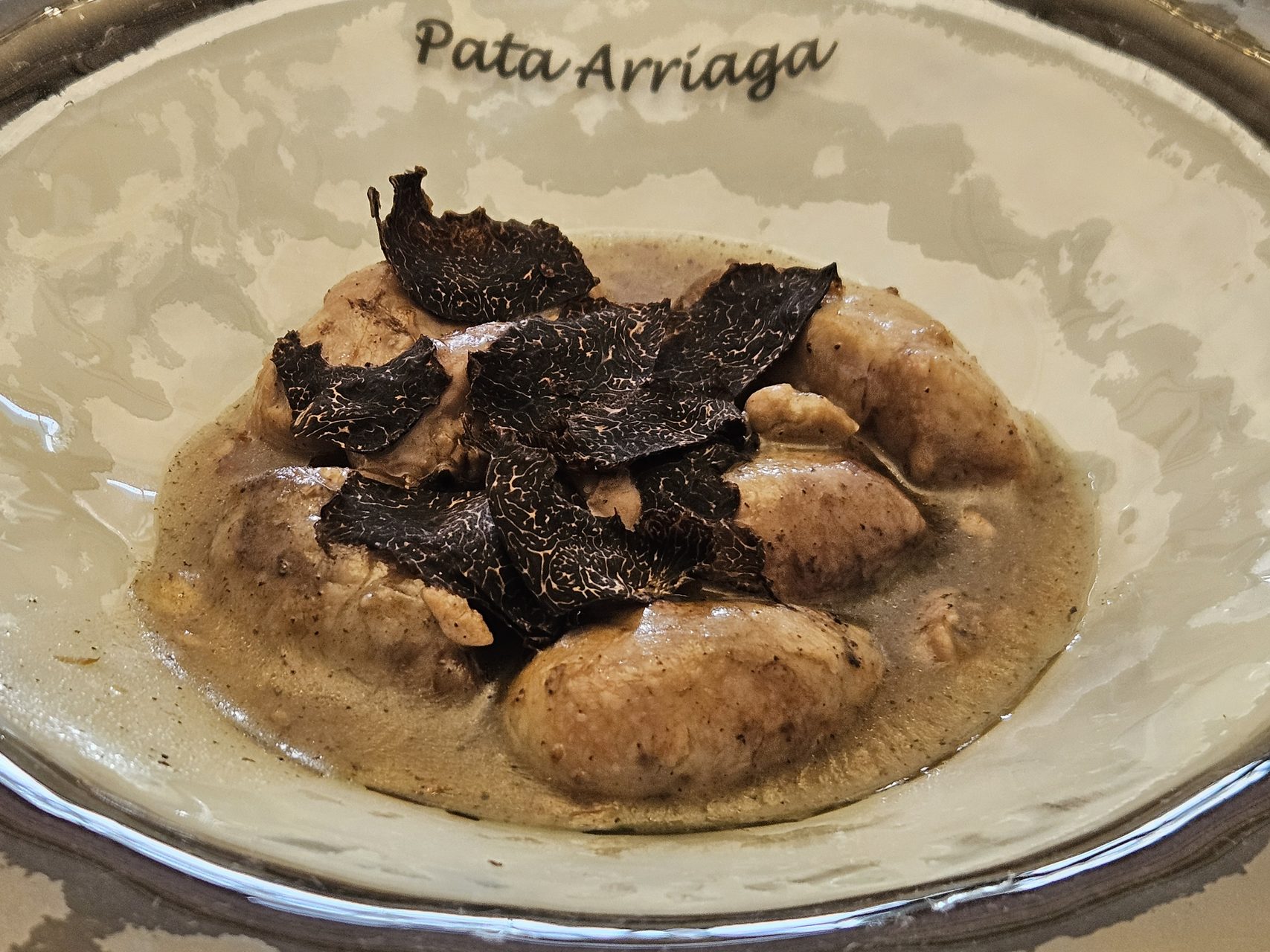 Castañuelas de cerdo con trufa